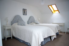 One of the upper bedrooms in the Calico House Apartment